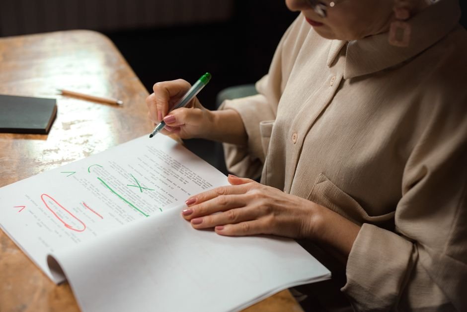 Senior reviewing Medicare Savings Program paperwork and eligibility documents